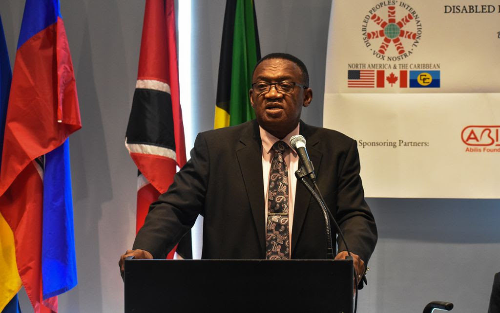Minister of Social Development, the Honourable Eugene Hamilton