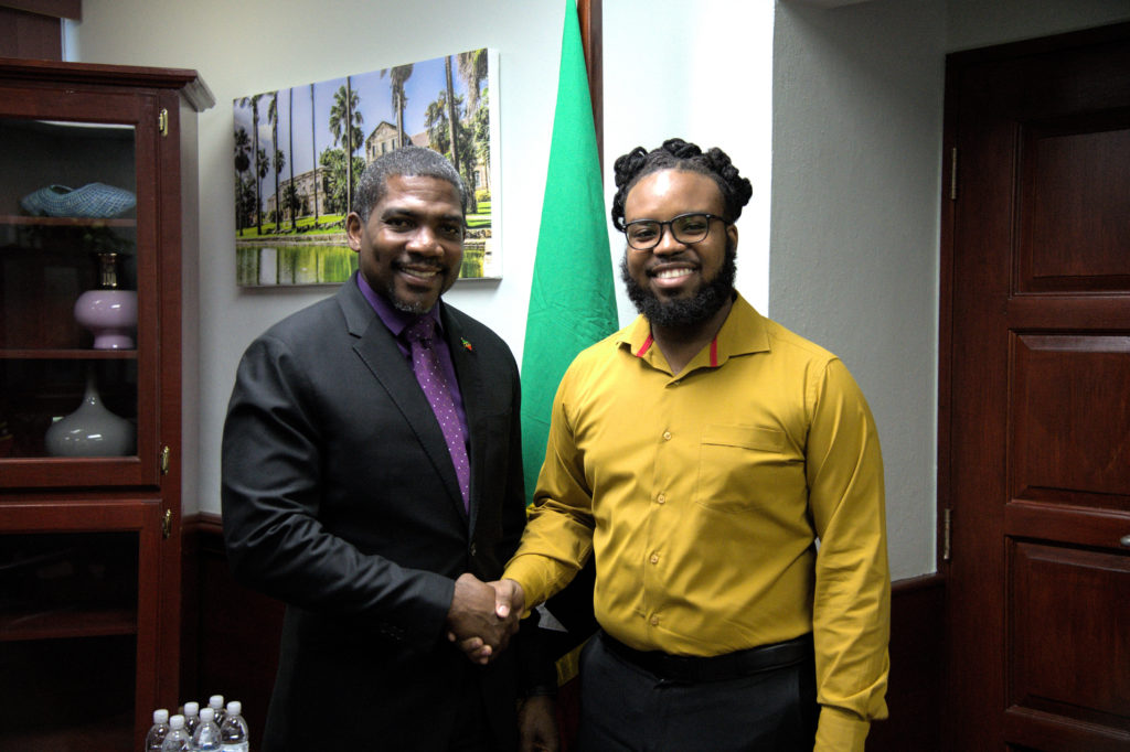 Prime Minister Drew Honours UWI Valedictorian, Mr. Kiandre Weekes with Scholarship
